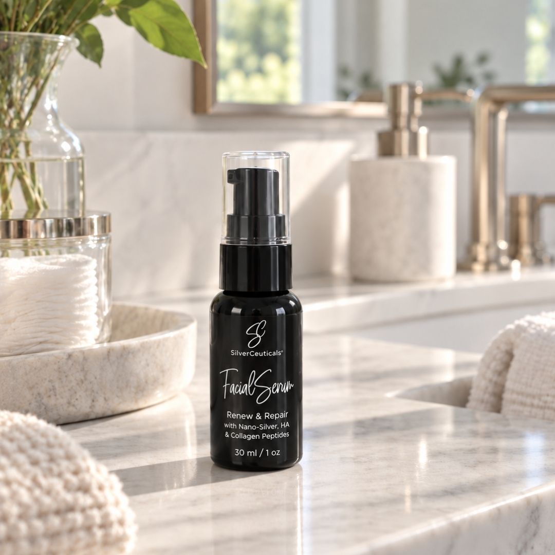 Black bottle of SilverCeuticals Facial Serum on a bright, slightly blurred, bathroom background.